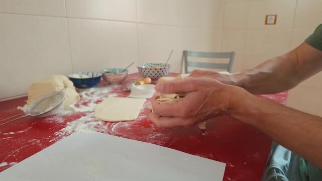 Making Traditional Vareniki: Hands Prepare Delicious Homemade Dumplings
