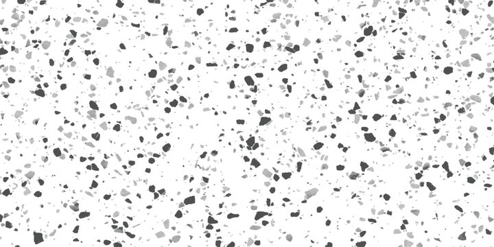 Abstract monochrome terrazzo pattern with small scattered dark gray stone chips and grainy texture design