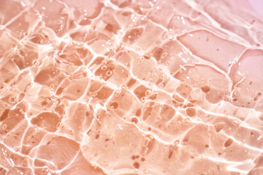Aloe vera gel texture close up with bubbles