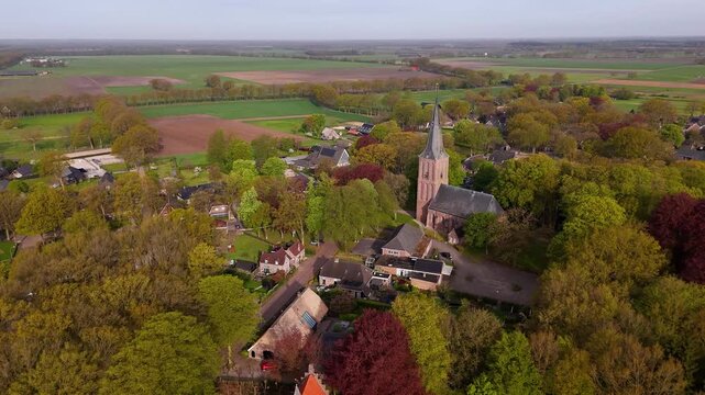 Aerial view of a small rural church village in spring