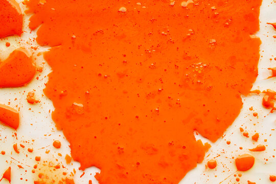 Abstract orange oil background with floating bubble spheres