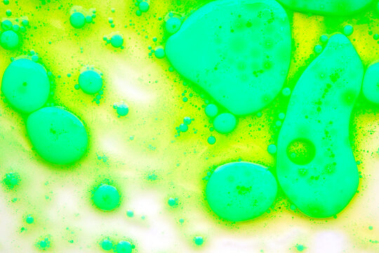 Abstract oil background with floating spheres and bubbles