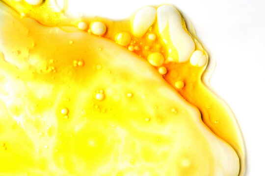Abstract golden oil background with bubbles and spheres