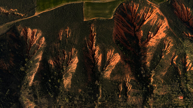 Sand-coloured badlands ridges in spring, Guadalajara, Spain