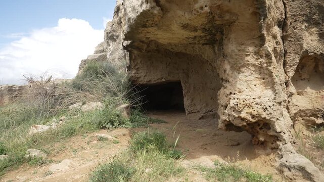 View of cave in Archaeological Site of the Tombs of the Kings on a sunny day, Paphos, Cyprus