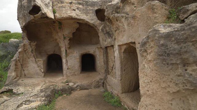 View of caves in Archaeological Site of the Tombs of the Kings on a sunny day, Paphos, Cyprus