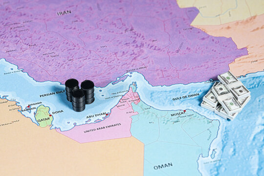 Oil barrels and money stacks on map of Middle East, symbolizing energy and economy