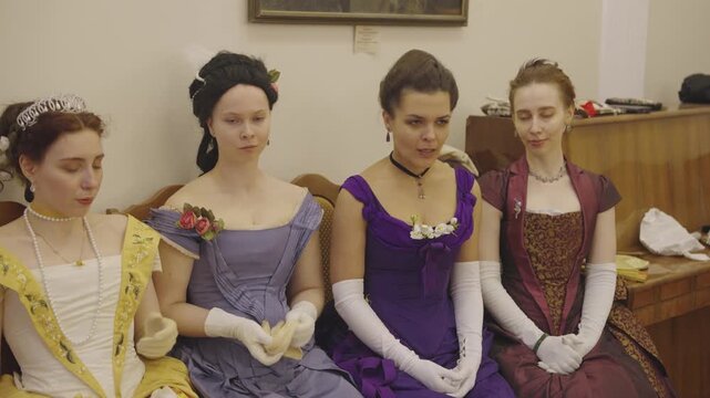 Four Noblewomen in Gowns Chatting at Ball