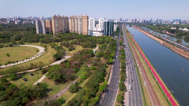 SAO PAULO, BRAZIL - MAY 2026: Aerial view of the Marginal Pinheiros highway with river reflection.