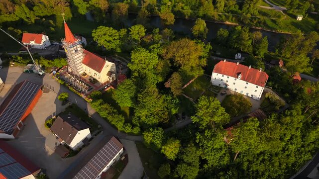 Drone footage of Inkofen near Freising, Germany, featuring Bavarian architecture, river landscape and historic center surrounded by green countryside.