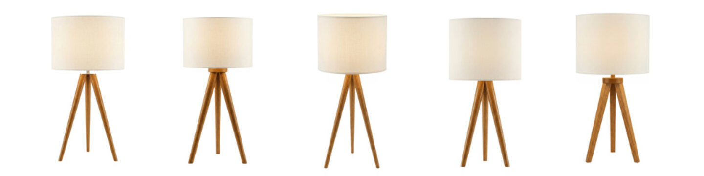 Set of table lamps with white shades on wooden tripod stands isolated on transparent background
