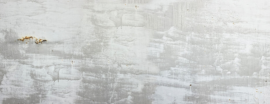 Iron wall with faded light gray paint, old and rusty. Gray rusty grunge metal texture with social media style filter. Horizontal vintage. Traces of runoff paint, a chaotically painted metal surface.