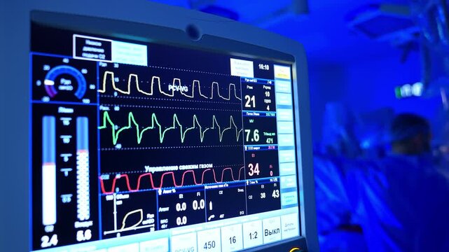 Patient monitor with vital signs. Medical device for tracking person's condition at operation.