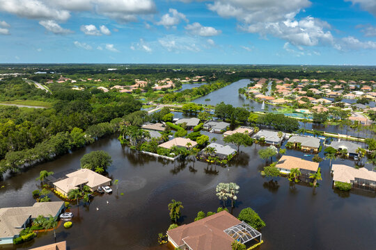 Hurricane Debby tropical rainstorm flooded residential homes in suburban community in Sarasota, Florida. Aftermath of natural disaster