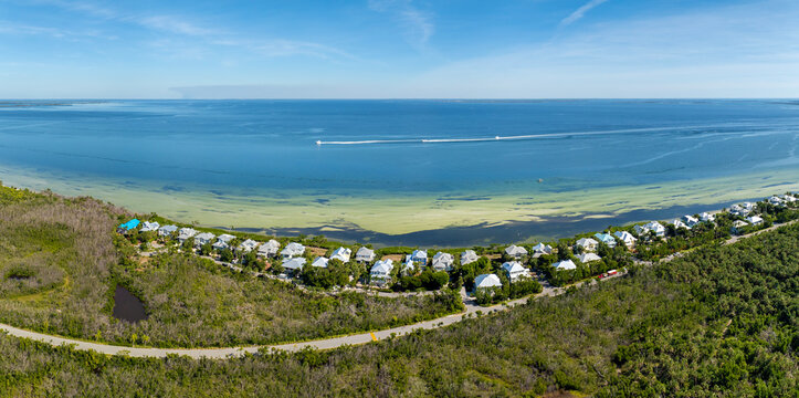 American waterfront houses in rural US suburbs. View from above of large residential homes in island small town Boca Grande on Gasparilla Island in southwest Florida
