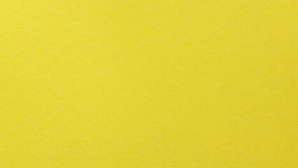 Fototapeta premium Yellow textured paper background with subtle grain for cheerful creative design projects