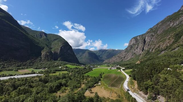Aerial view of Fj&aelig;rland valley with farms and waterfall, Sognefjord, Norway