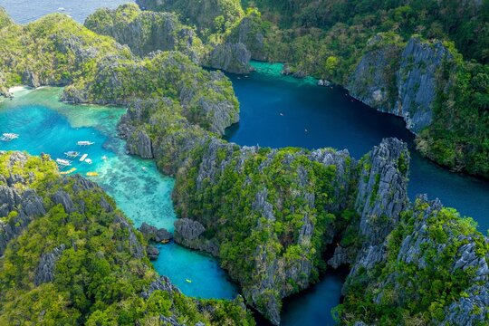 Aerial view of Big and Small Lagoon limestone cliffs El Nido