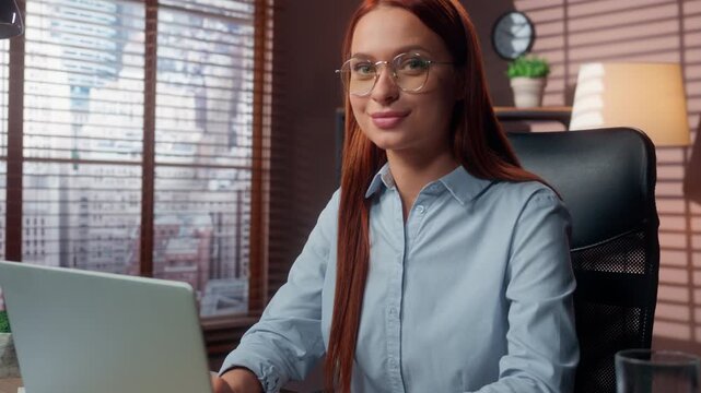Friendly Caucasian business woman working with laptop showing finger hey you come here gesture welcoming inviting looking at camera in office businesswoman female girl invite candidate for recruiting