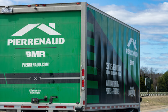 Quebec, Canada, 24 April 2026 : A semi-trailer truck displays Pierrenaud and BMR branding for home renovation and construction materials.