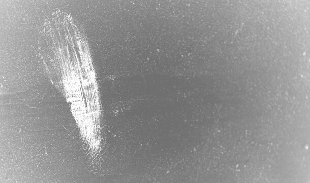 Dark black grunge surface texture with white chalk streak brushstroke mark