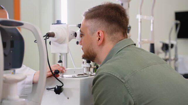 Man undergoing comprehensive eye exam at ophthalmology clinic