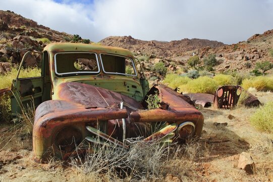 Scrap vehicles near the Namtib Lodge in the Tiras mountains, Namibia, Africa