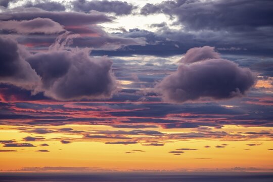 Glowing evening sky, evening glow, dramatic evening mood, sunset with clouds over the sea, view from the top of Hermannsdalstinden, Moskenes&ouml;y, Lofoten, Nordland, Norway