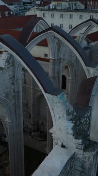 Cinematic Aerial View of Ancient Gothic Church in Lisbon Portugal at Golden Hour