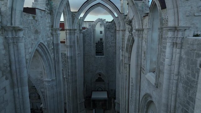 Cinematic Aerial View of Ancient Gothic Church in Lisbon Portugal at Golden Hour