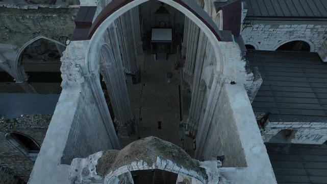 Cinematic Aerial View of Ancient Gothic Church in Lisbon Portugal at Golden Hour