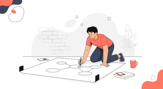 Man drawing mind map on floor, brainstorming ideas, planning strategy, creative thinking concept