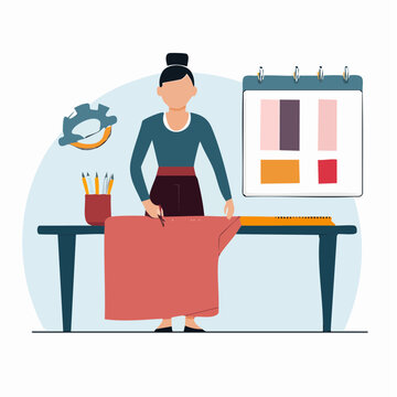 Designer working on garment with calendar and tools