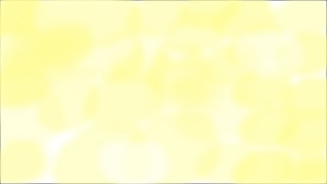 黄色、オレンジ色、黄緑の雲のようなまだら模様の背景素材。パステルカラーで使いやすい。