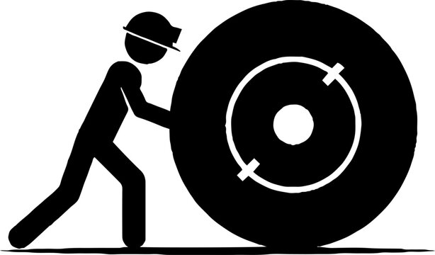 Construction worker rolling a large industrial wheel