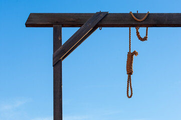 Fototapeta premium Close up of the hanging noose on the gallows in the courtyard of the historic courthouse in the infamous Wild West town of Tombstone, Arizona, USA
