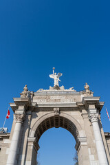 Fototapeta premium Princes Gates against blue sky at Exhibition Place in Toronto, Canada, in 2026. Princes Gates serves as a monumental gateway and the eastern entrance to the Canadian National Exhibition (CNE) grounds.