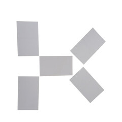 Fototapeta premium Abstract geometric k shape in gray color on plain background