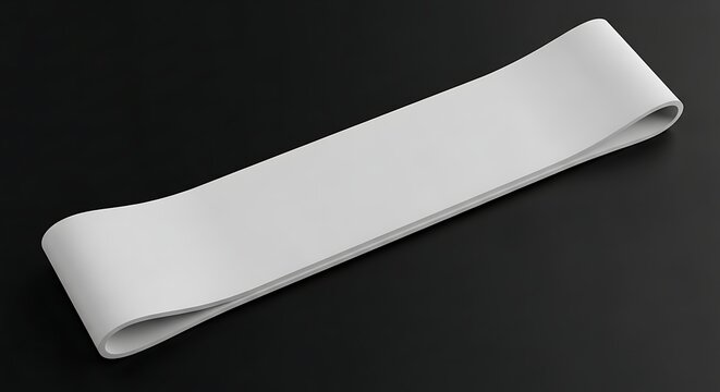 Isolated grey resistance band for fitness exercise, looped elastic latex strip for stretching and muscle strengthening