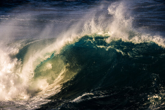 Giant storm wave breaking along the Sydney east coast, Australia with powerful surf, sea spray and dramatic ocean energy.