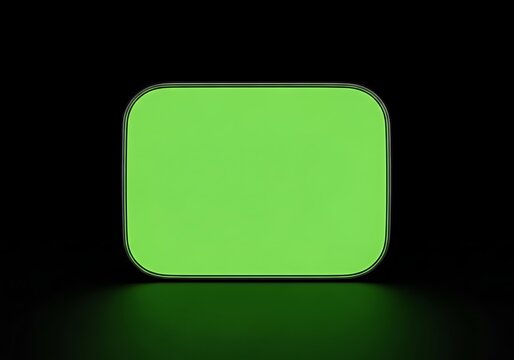 Isolated rectangular green screen frame with rounded corners against dark background, video placeholder, chroma key effect