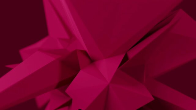 Abstract 3D loop animation featuring polygonal (low-poly) geometric objects resembling crystals or pointed star shapes with a matte texture in an elegant maroon (magenta burgundy) color.