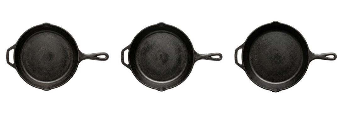 Set and collection of classic round black cast iron frying pan isolated on white background