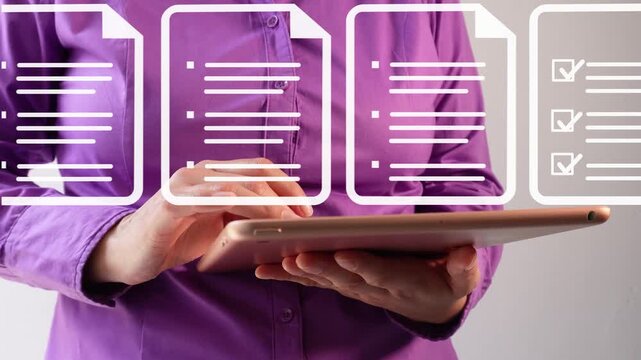 Close-up of a businesswoman interacting with her tablet an animation of various documents that are passing by