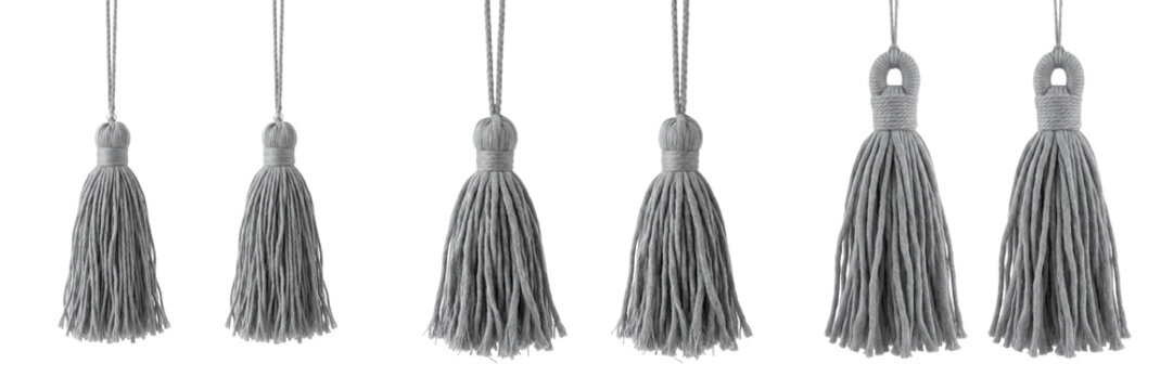 Set and collection of two grey decorative curtain tassels isolated on white transparent png background
