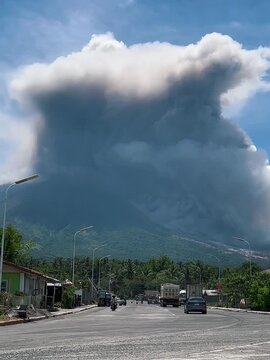 Mayon Volcano Eruption Lava Flow and Ash Fall with a black clouds in Camalig Albay Philippines 