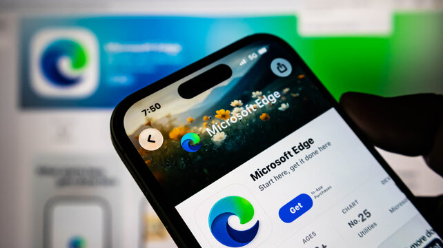 Closeup of a hand holding a smartphone displaying the microsoft edge browser app page in the apple app store on a blurred background