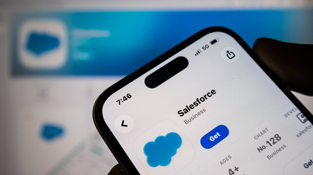 Closeup of a smartphone screen displaying the salesforce mobile application page on the apple app store, with the app icon and download button