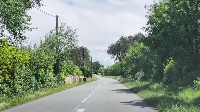 Driving Along a Quiet Countryside Road in Rural Paris France