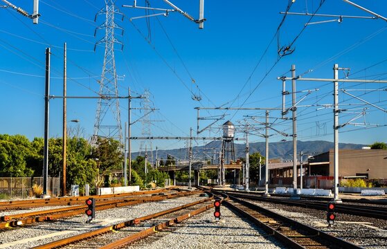 San Jose Diridon rail station in California, United States, serving multiple rail and light rail services, with tracks and overhead catenary lines